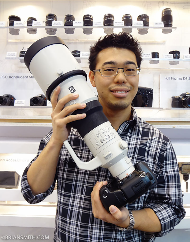 Sony Alpha Product Manager Kenta Honjo holds the new Sony 500/4 G Lens