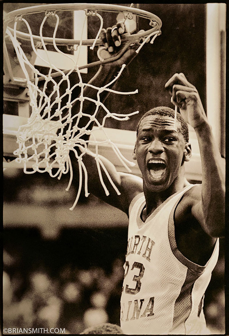Michael Jordan cuts down the net after his North Carolina Tarheels defeated Georgetown to win the NCAA Championship